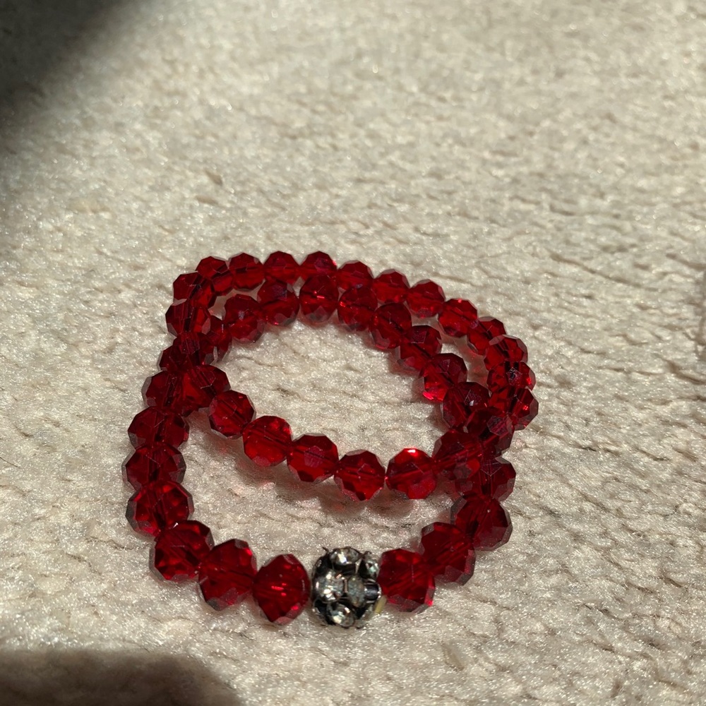 Set of two red beaded bracelets